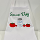 Apron with tomato and mason jar all embroidered for your next italian sauce or tomato day.