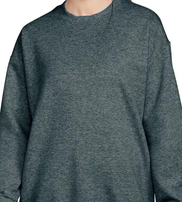 Dark gray sweatshirt worn by a person on a white background