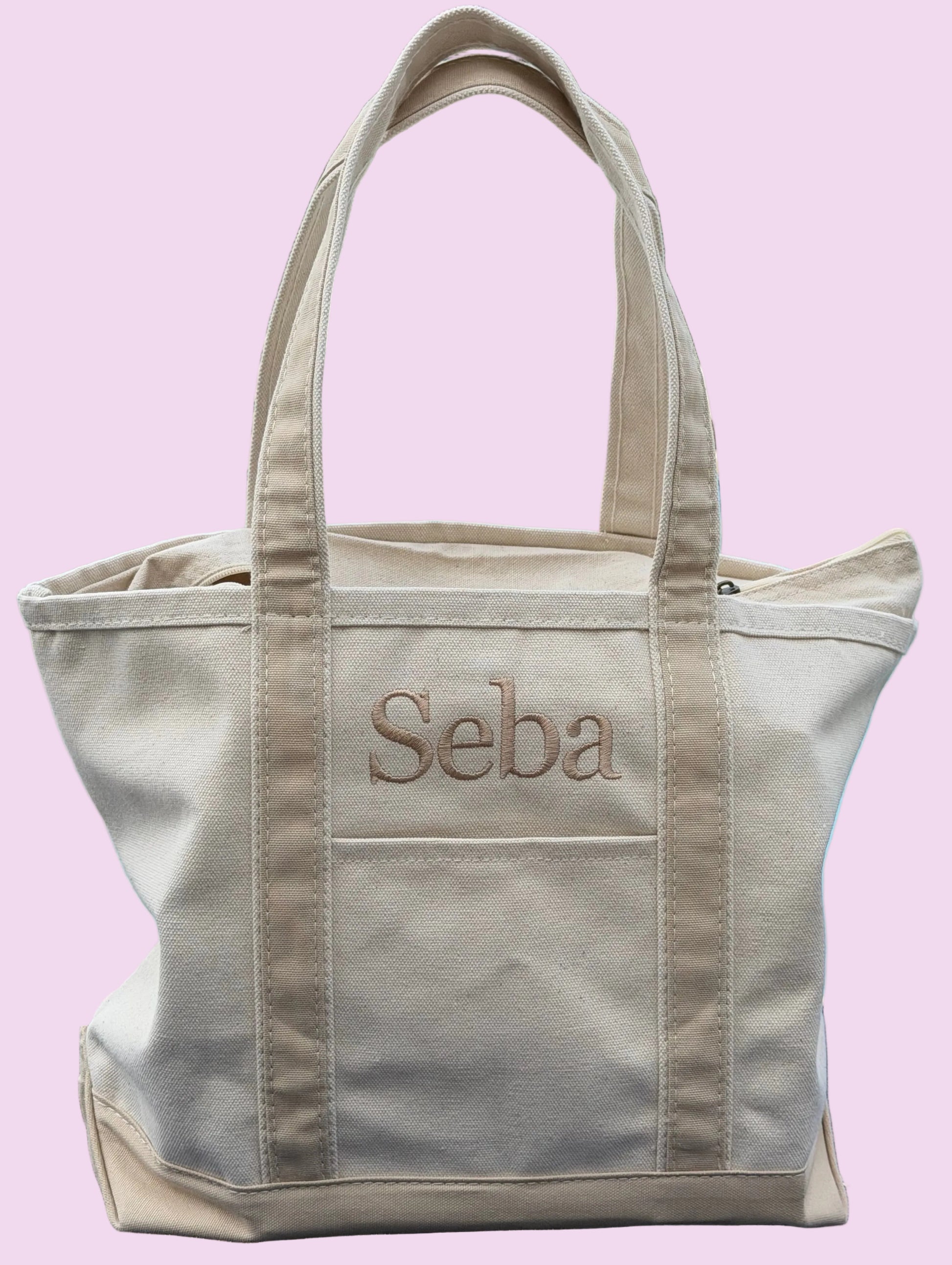CB station beige trim medium tote. Name embroidered for a personalized look. Outr pocket and inner zipper pocket with top zipper. a very useful tote they will love.
