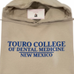 beige hoodie with blue font