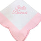 quilt baby blanket monogrammed with name in ballet font script. embroidered with light pink thread. keepsake baby gift