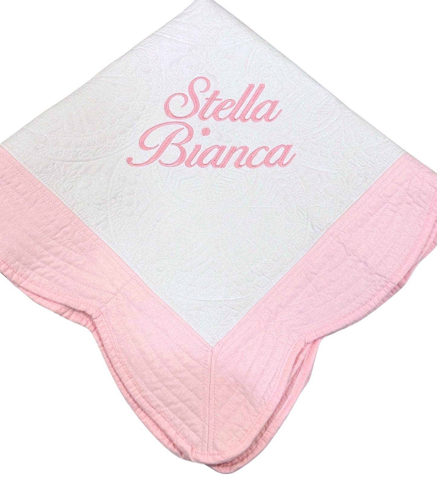 quilt baby blanket monogrammed with name in ballet font script. embroidered with light pink thread. keepsake baby gift