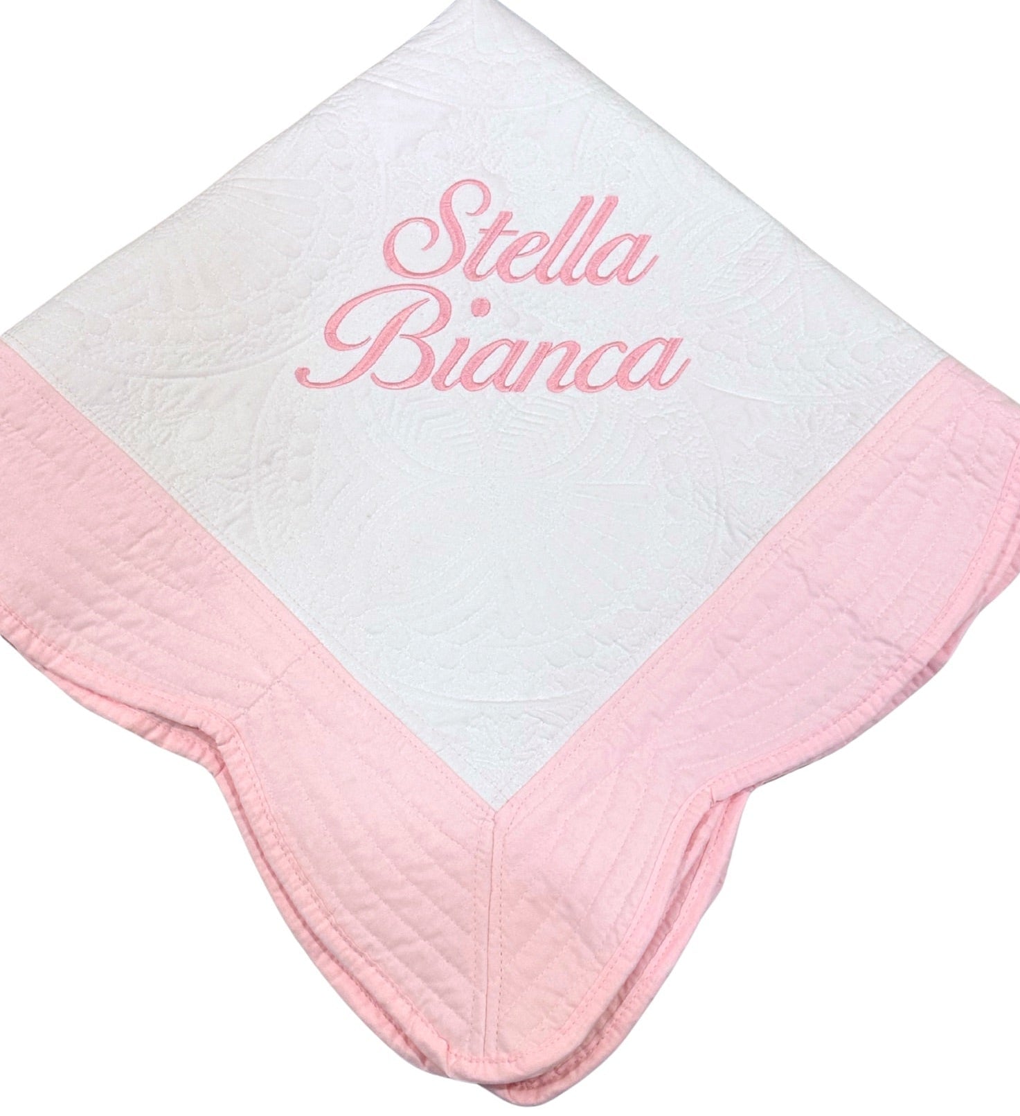 quilt baby blanket monogrammed with name in ballet font script. embroidered with light pink thread. keepsake baby gift