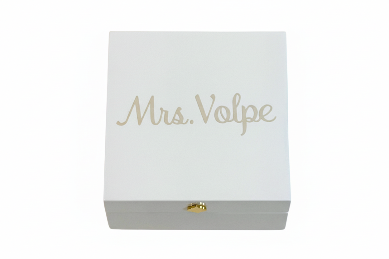 white lacquer jewelry box velvet interior  gold decor outside of box. 4x4x2

