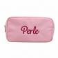 medium pink nylon cosmetic bag embroidered with name. Stitchtopia font