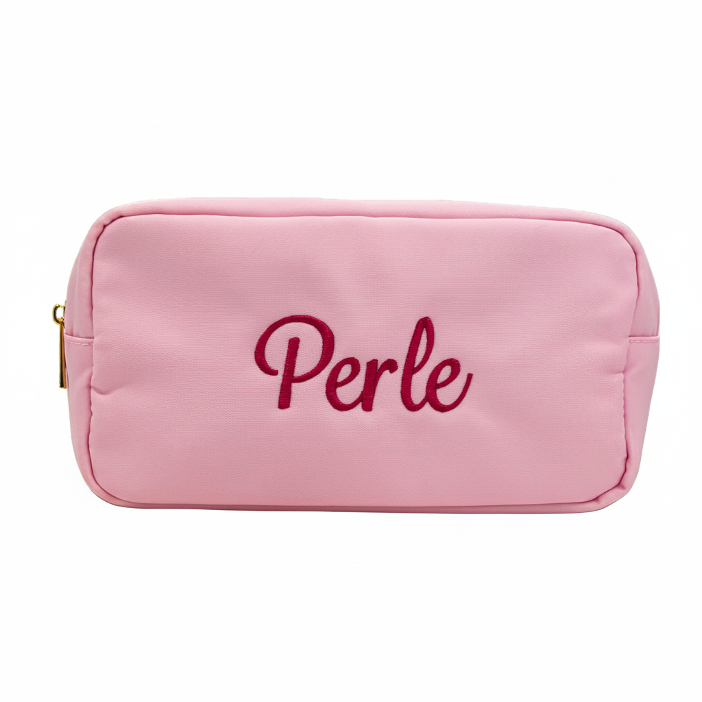 medium pink nylon cosmetic bag embroidered with name. Stitchtopia font